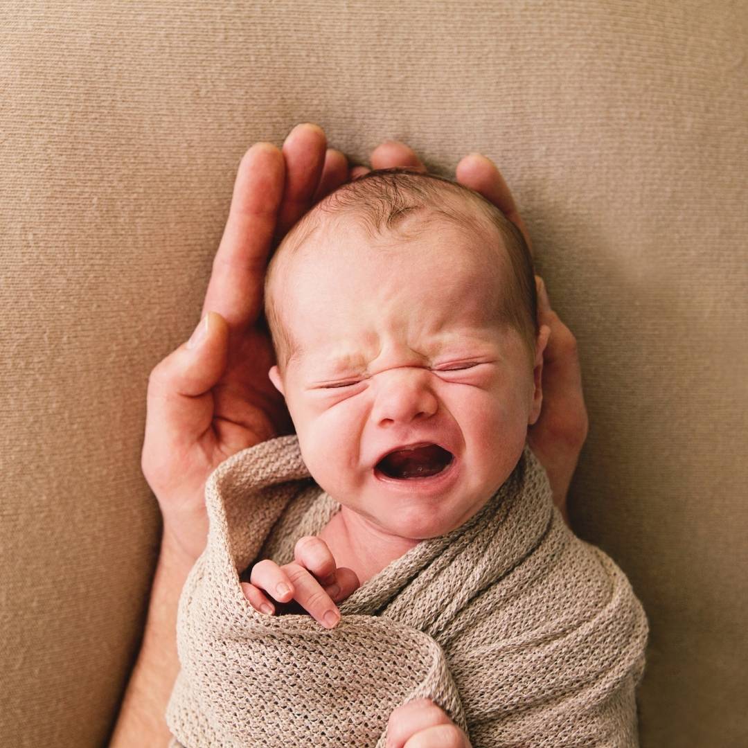 Fussy crying newborn baby at night: why it happens and what can you do?